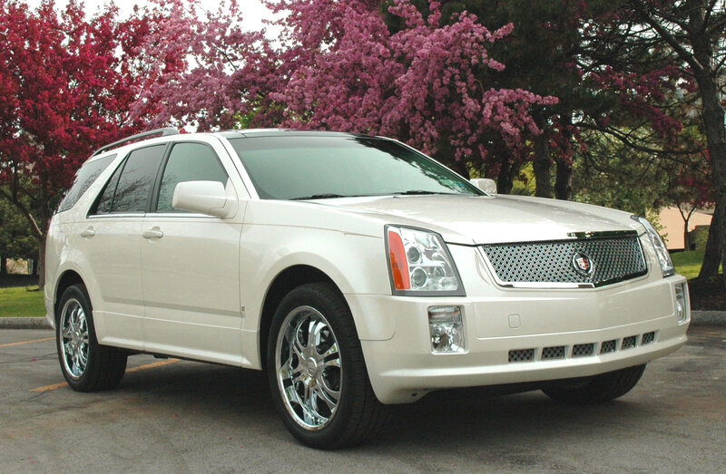 White Cadillac Suv — Serene