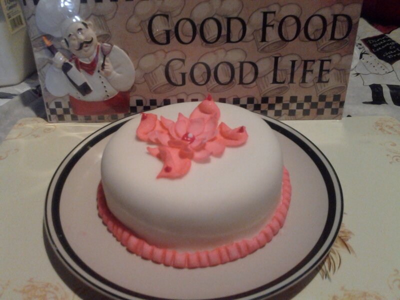 White Cake with Pink Flower
