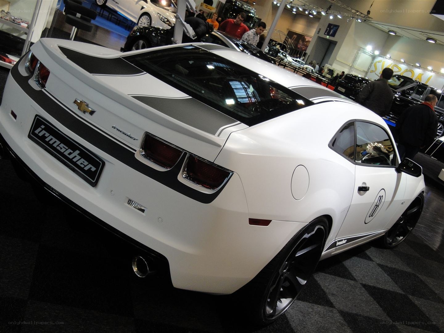 White Camaro at auto show