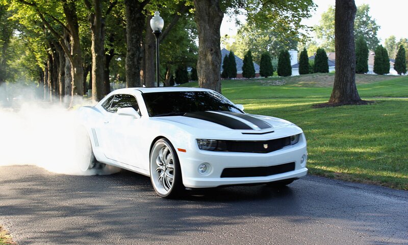 White Camaro doing a burnout