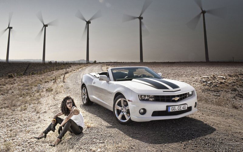 White Camaro in desert landscape