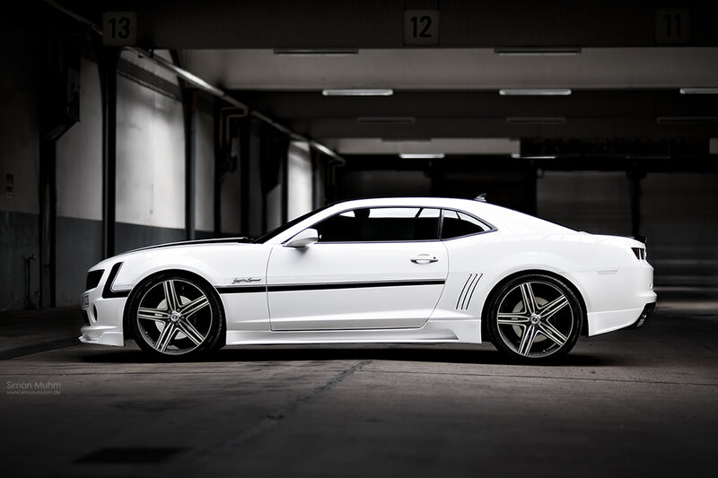 white camaro in garage