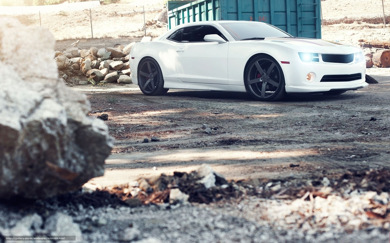 white camaro in industrial setting