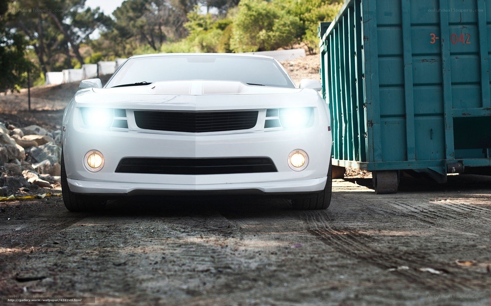 white camaro in industrial setting
