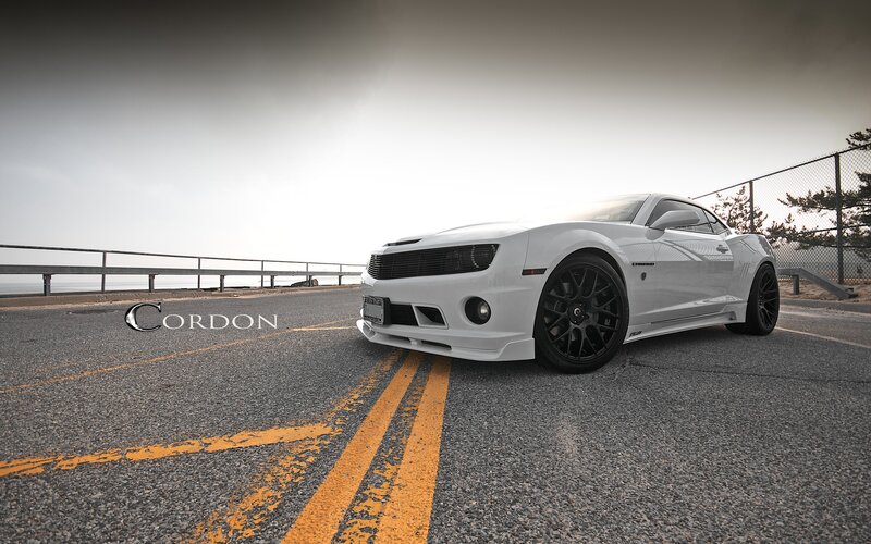 White Camaro on Road — Dramatic