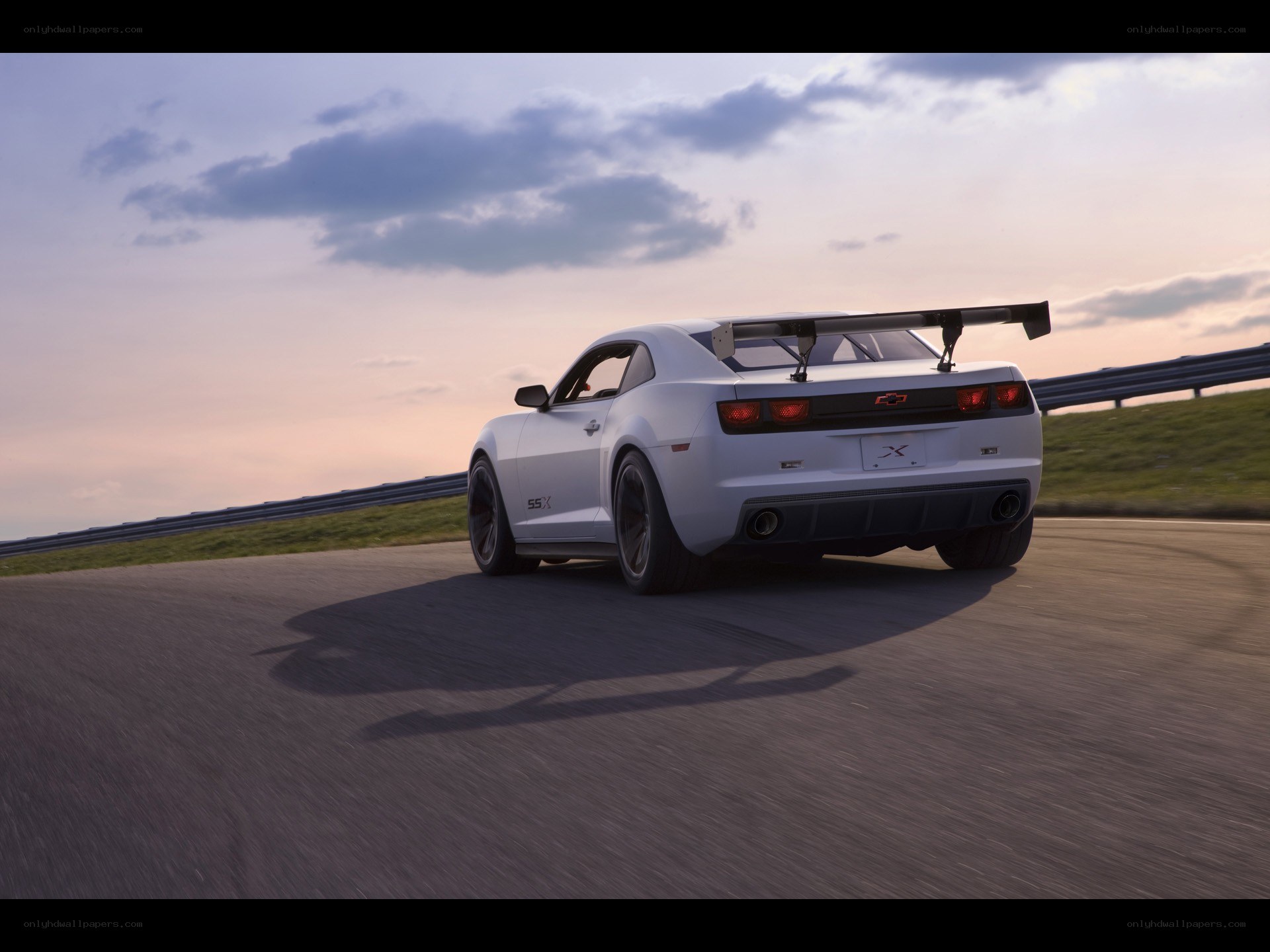 White Camaro SSX on racetrack