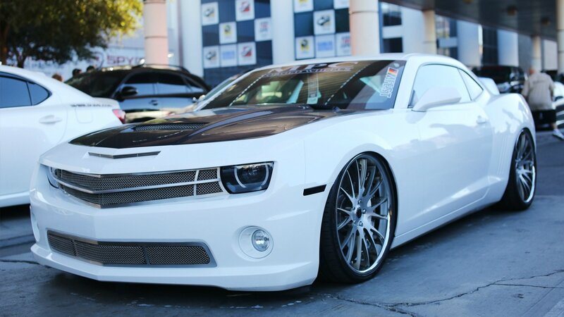 white camaro with custom wheels