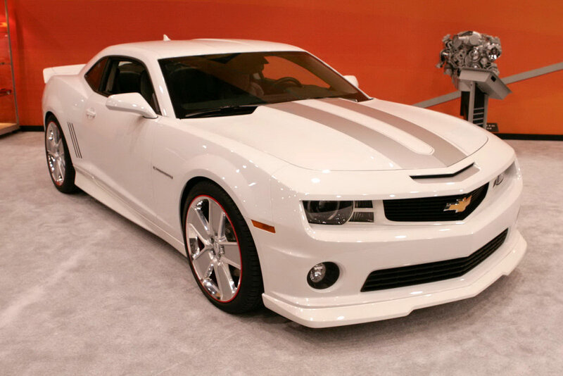 White Camaro with racing stripes