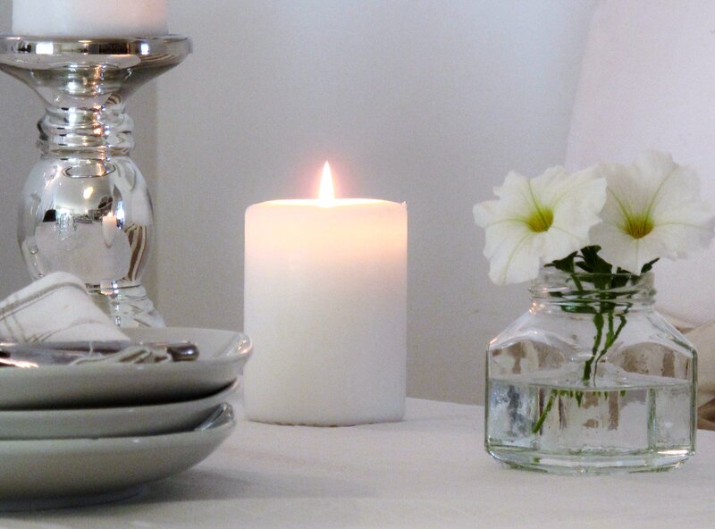 White Candle and Flowers
