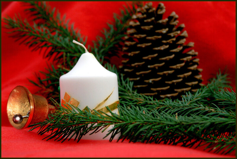 White Candle with Pine Branches
