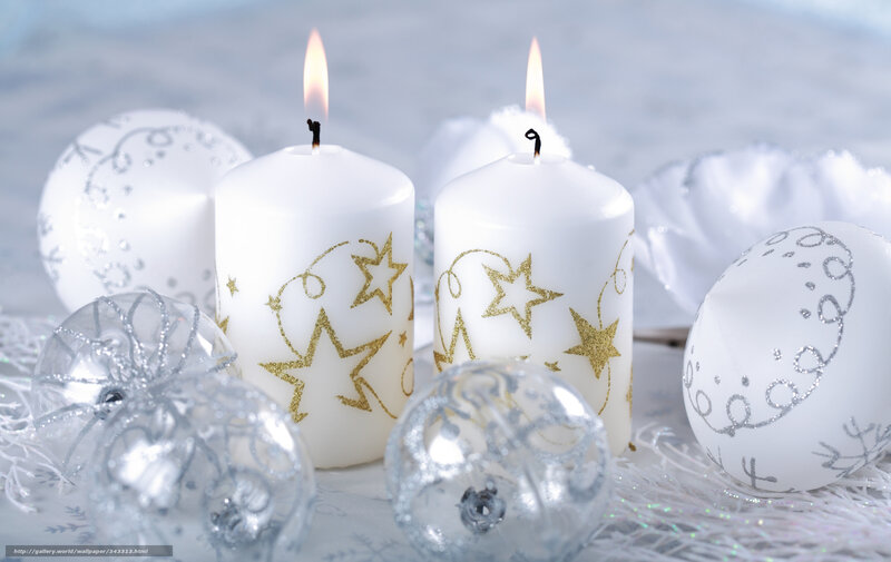 white candles with ornaments