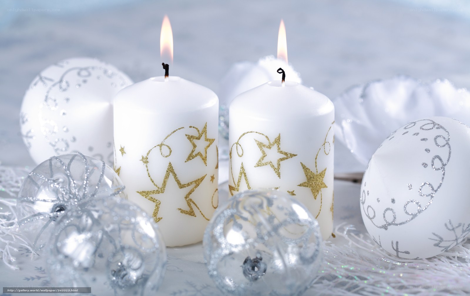white candles with ornaments