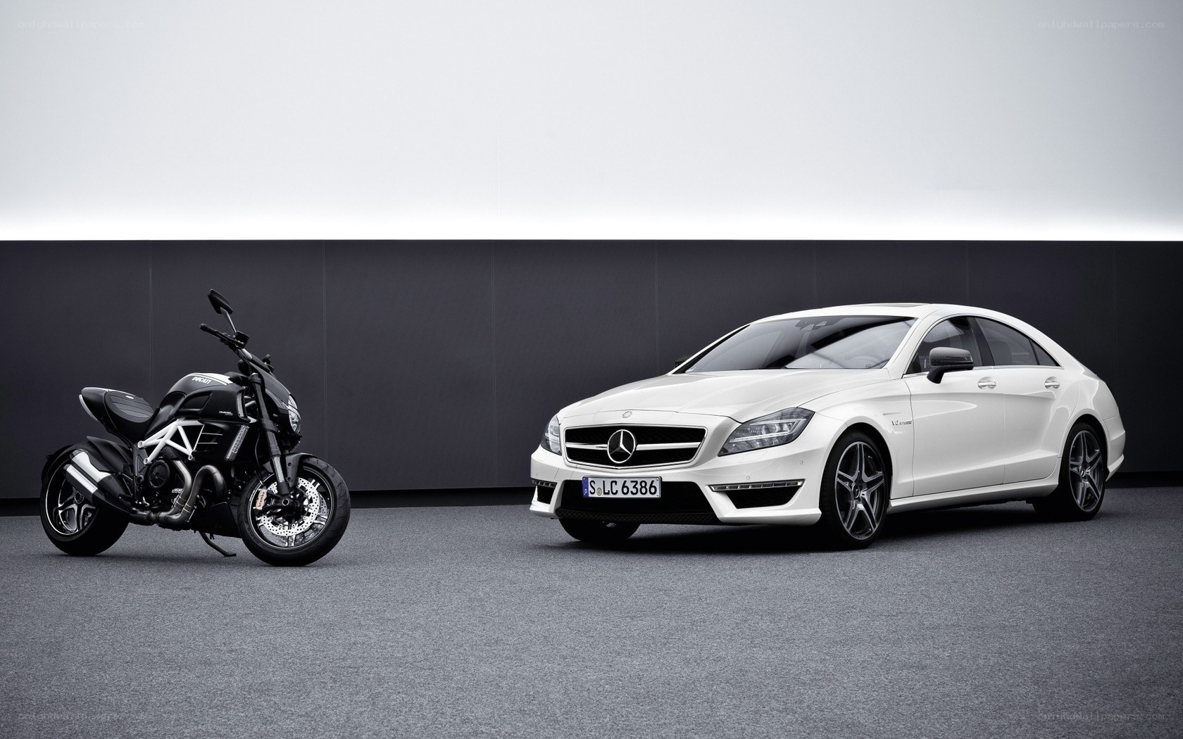 White car and black motorcycle