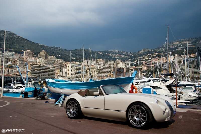 White car at a marina