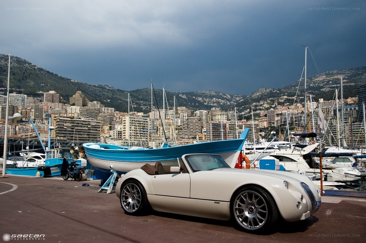 White car at a marina