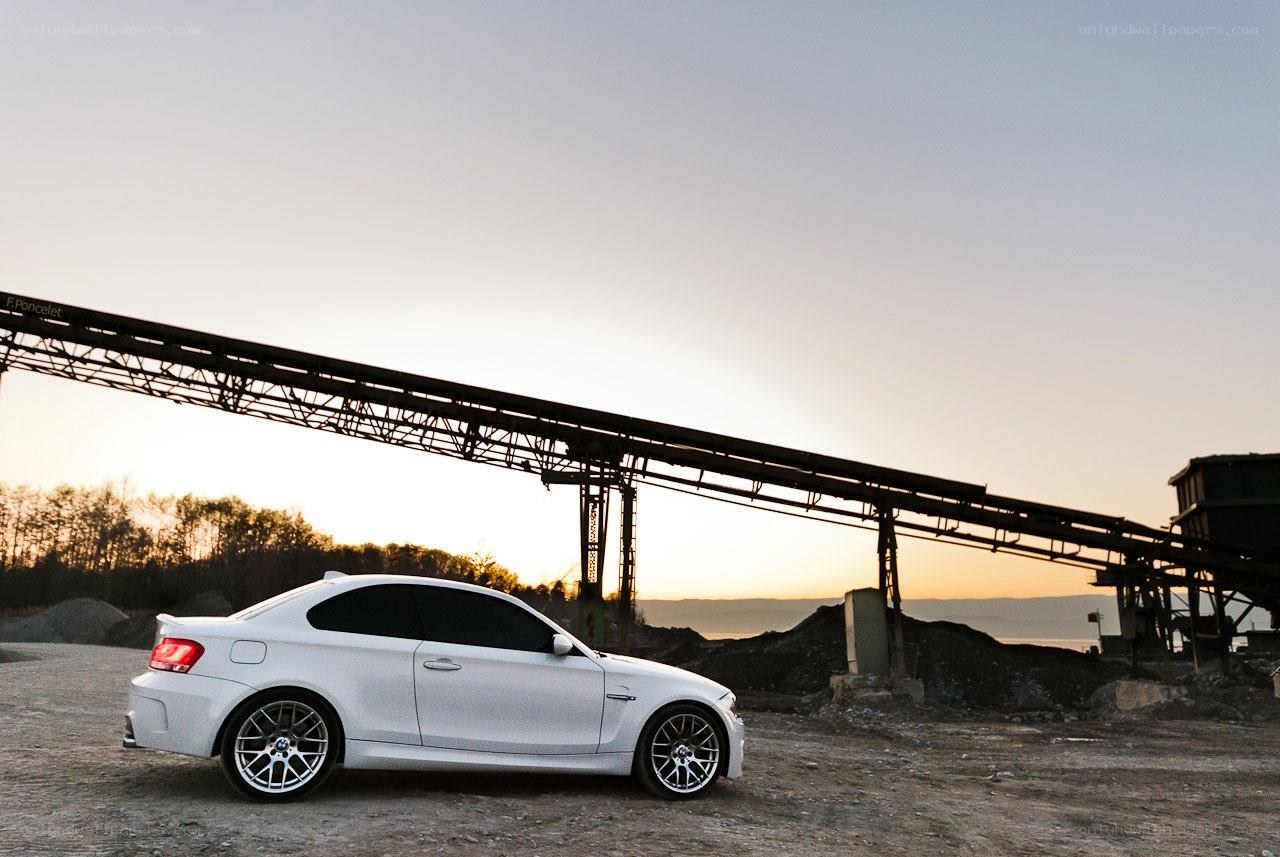 White car at industrial site