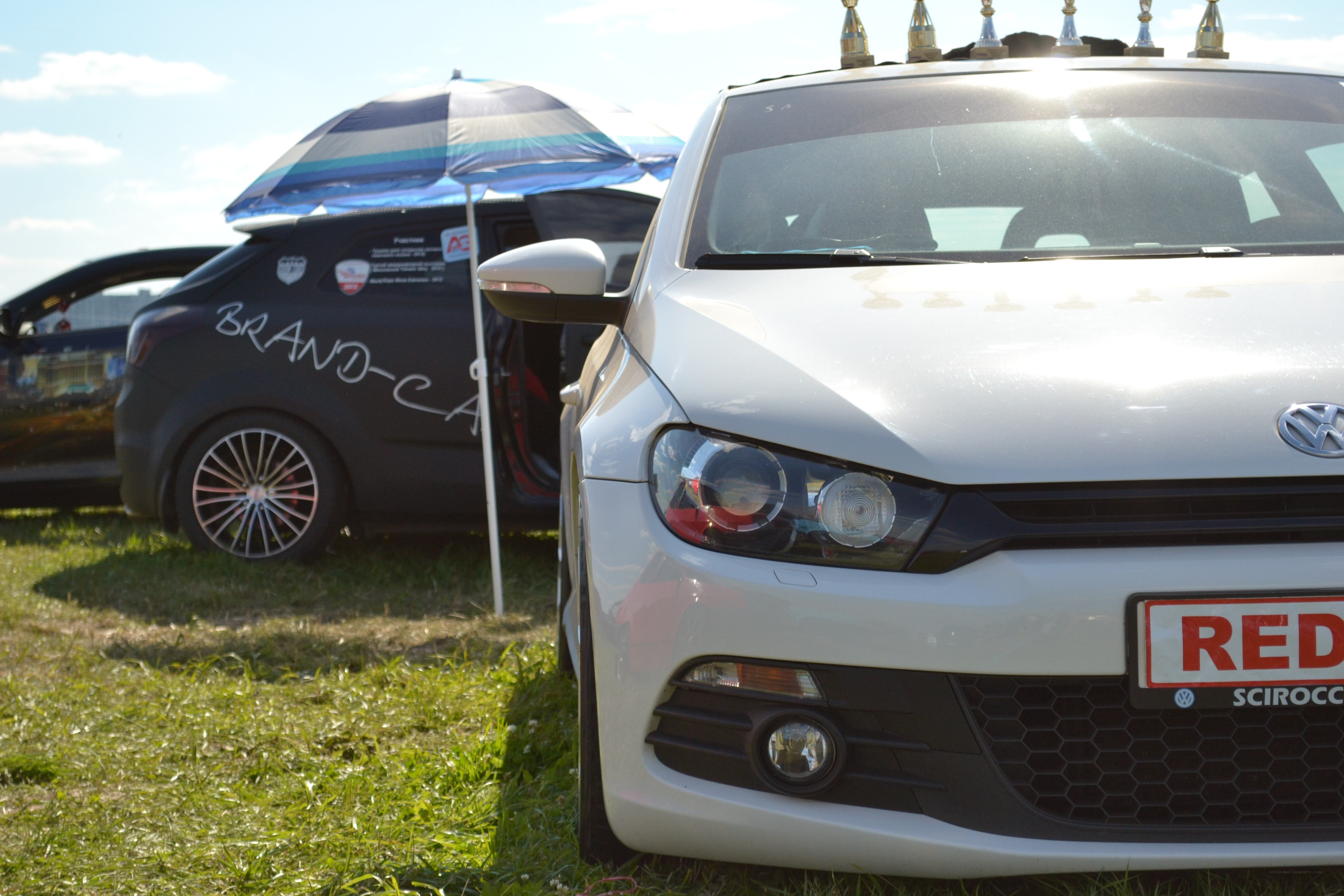 White car at outdoor event
