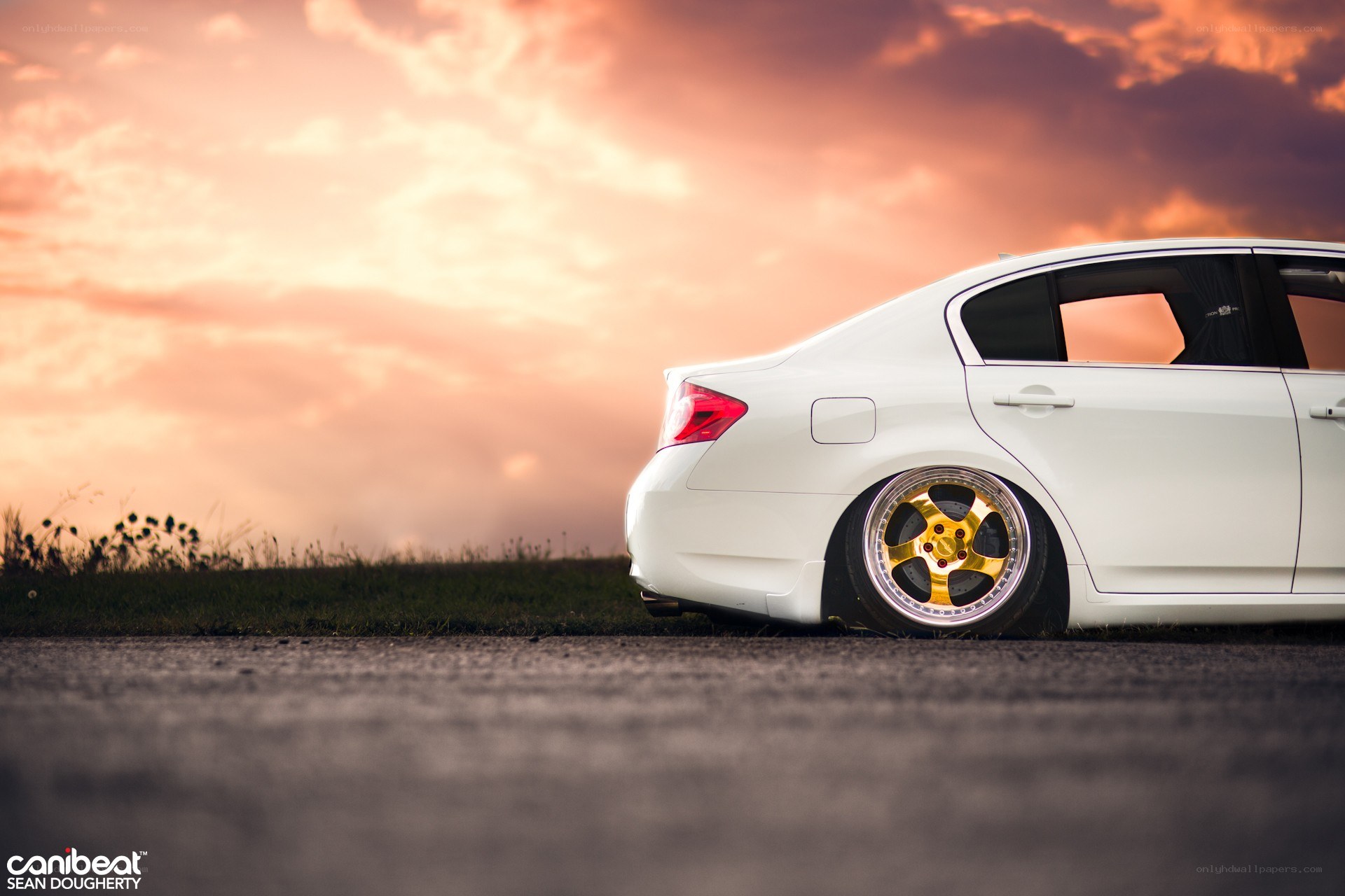 White car at sunset