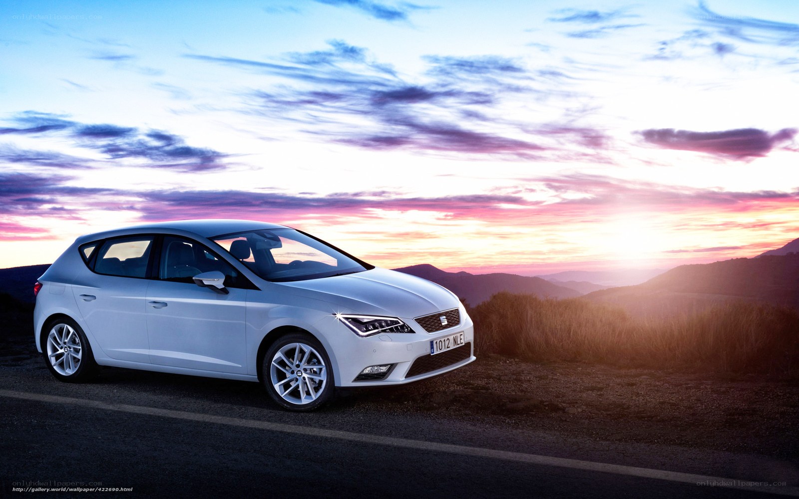 White car at sunset
