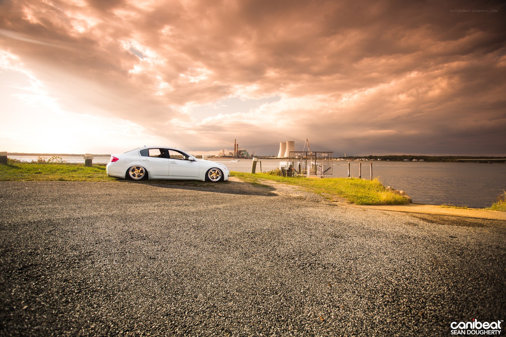 White car by the water