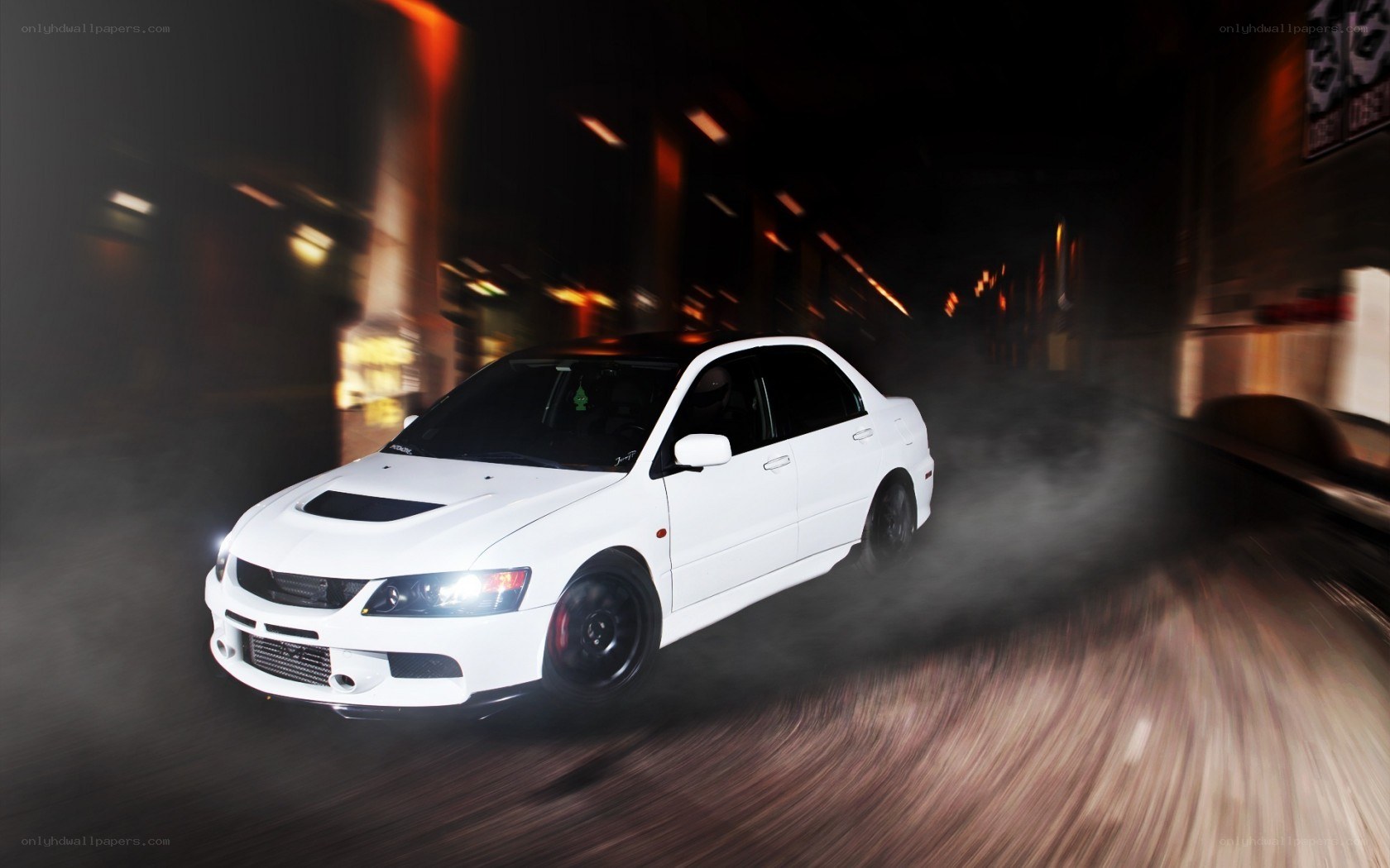 White car drifting at night