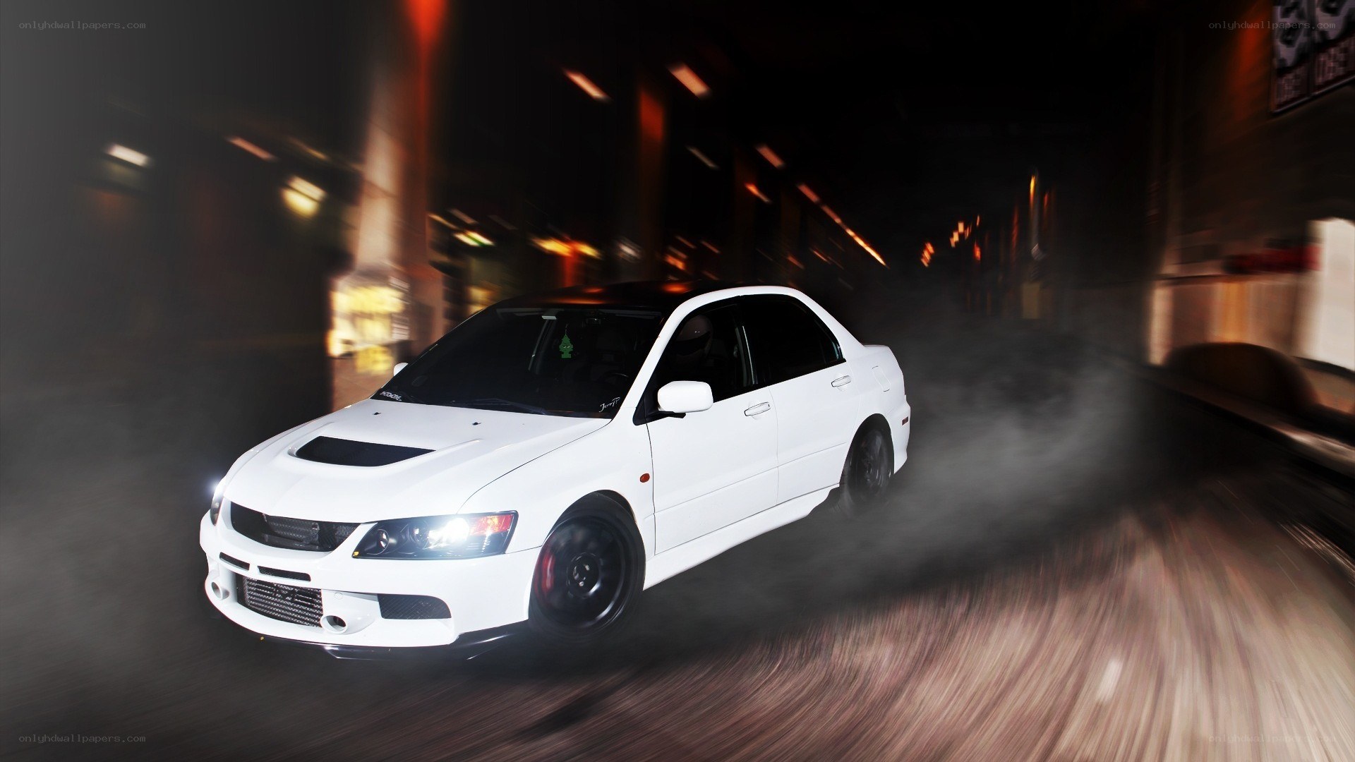 white car drifting at night
