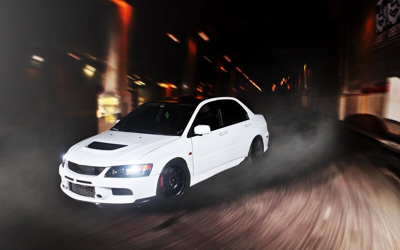 white car drifting at night