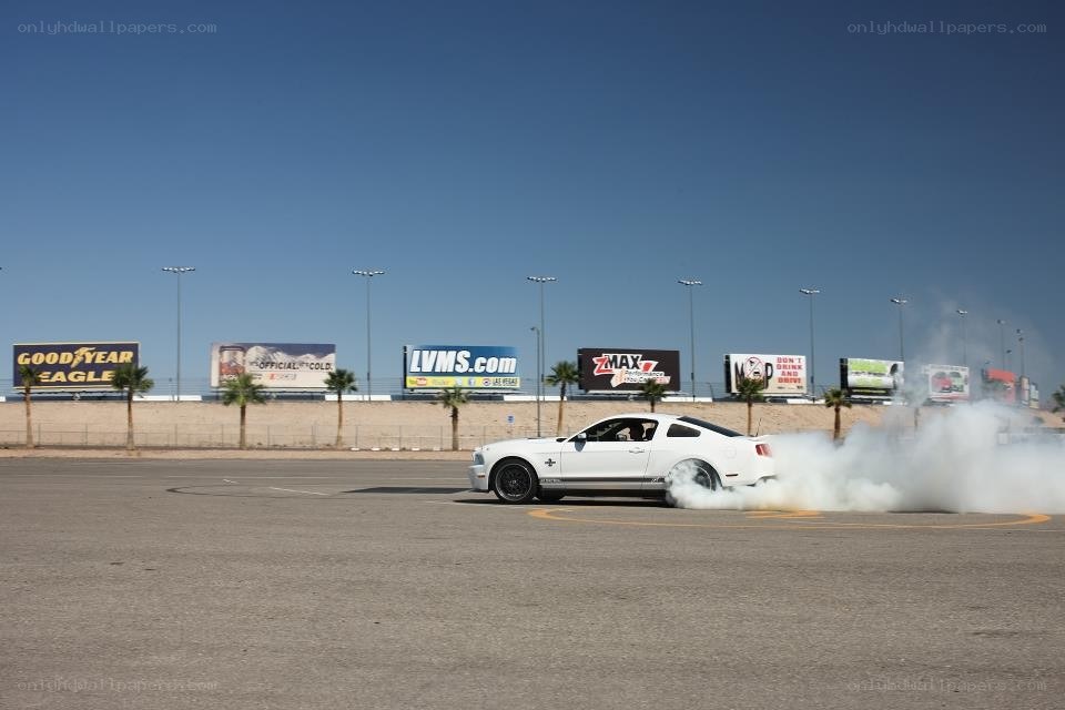 White car drifting on track