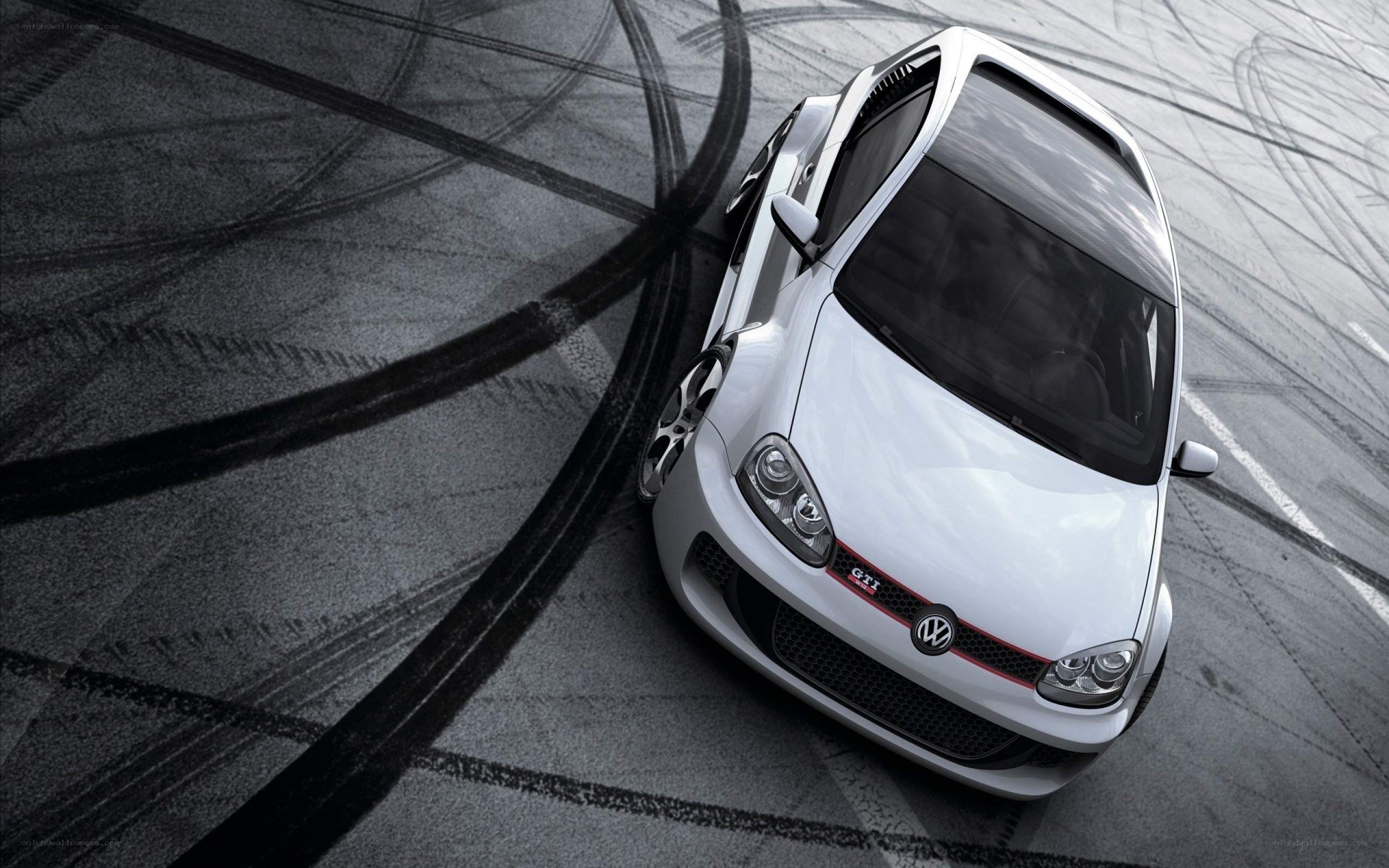 white car drifting on track