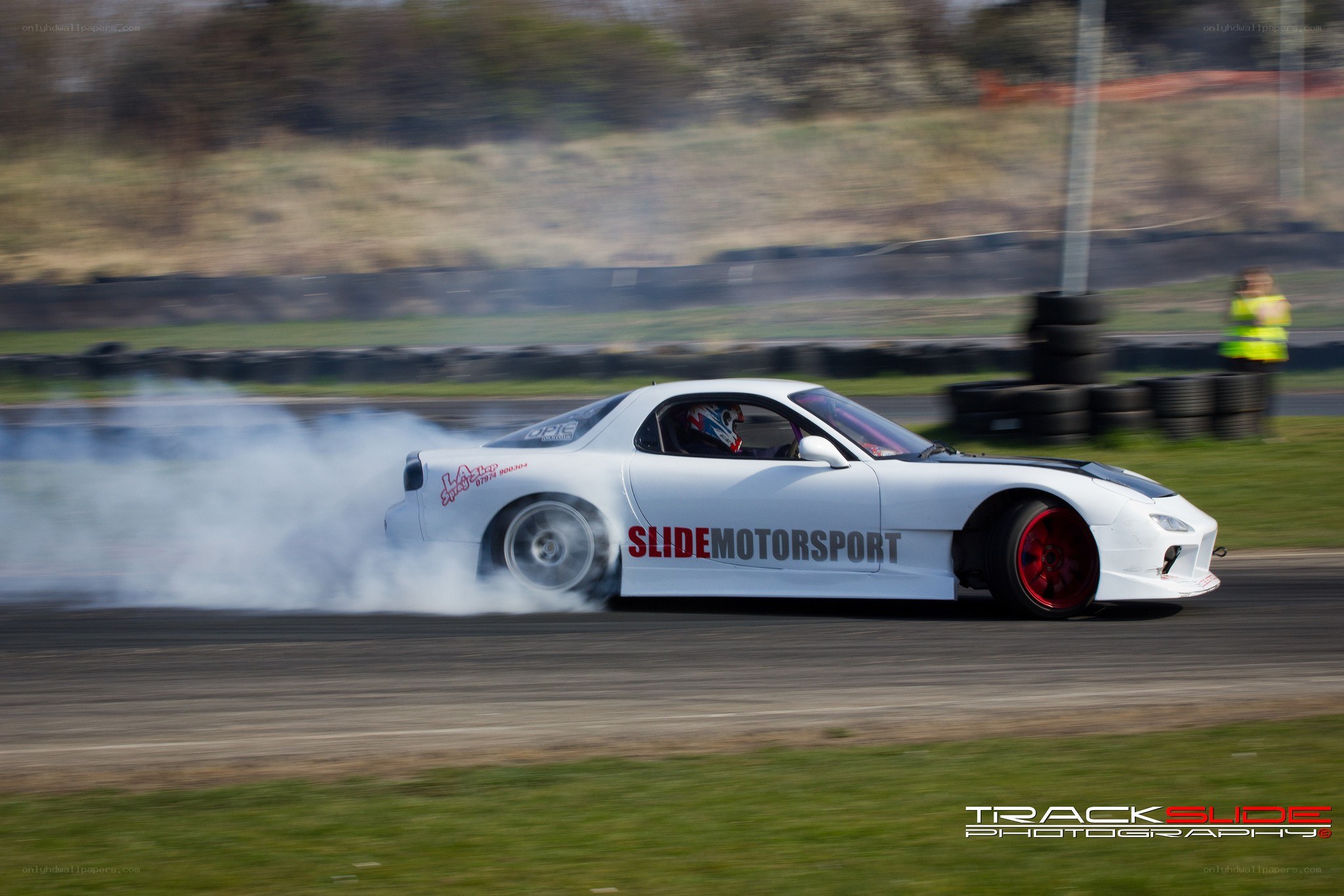 White car drifting on track