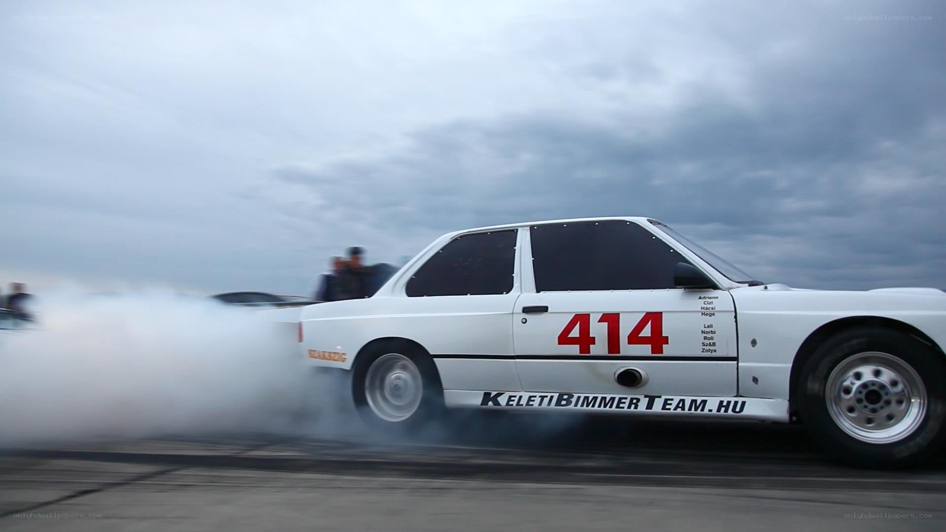 White car drifting on track