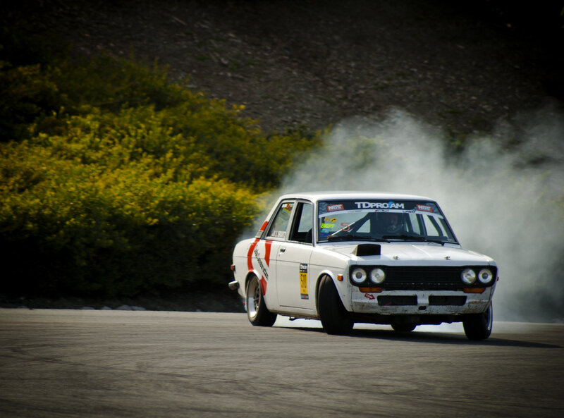 White car drifting on track