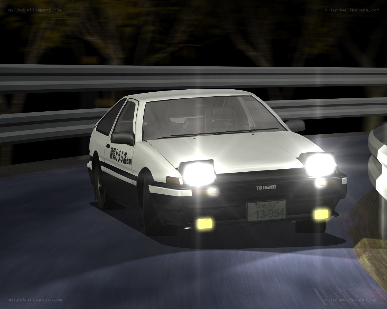 white car driving at night