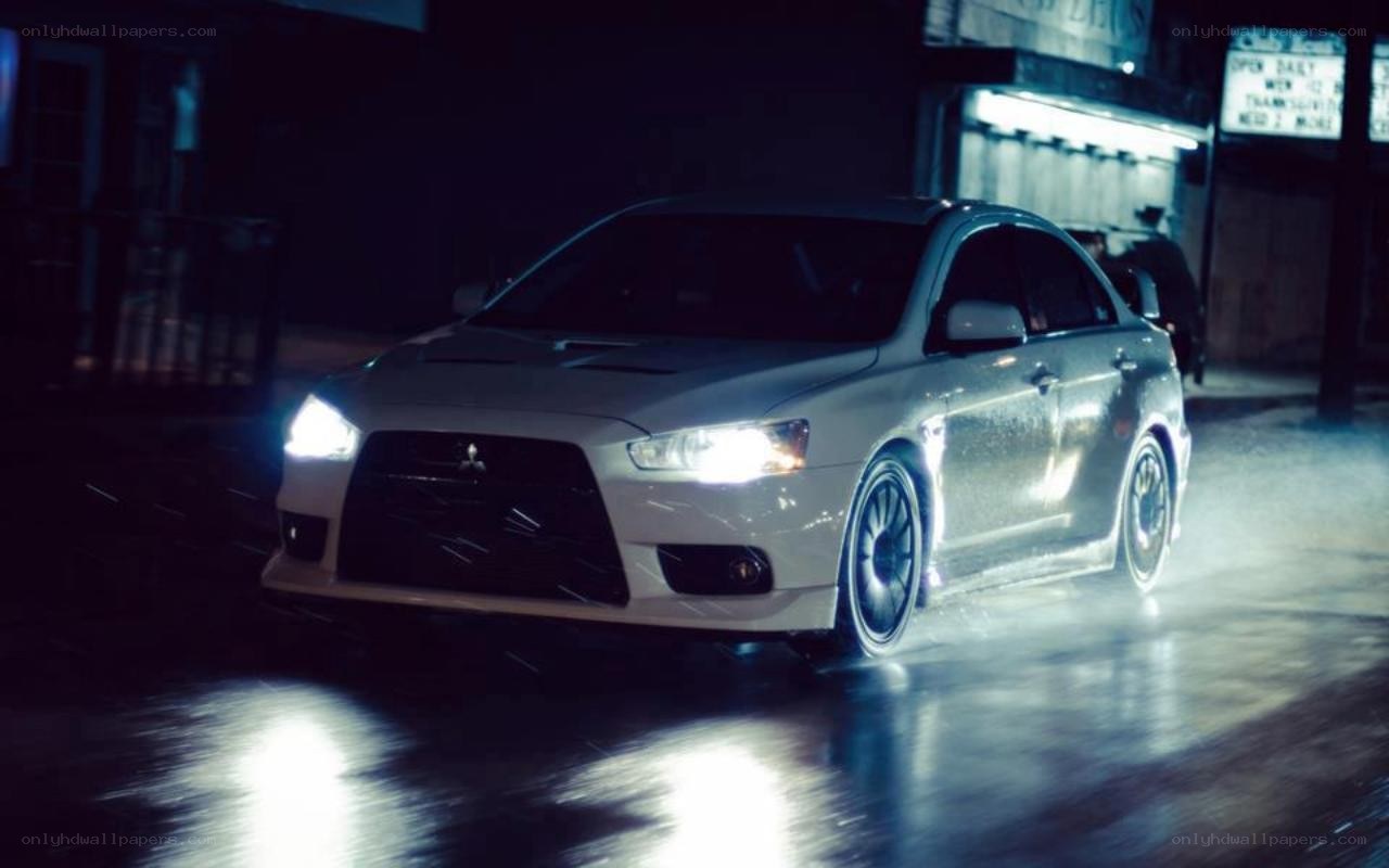 white car driving at night