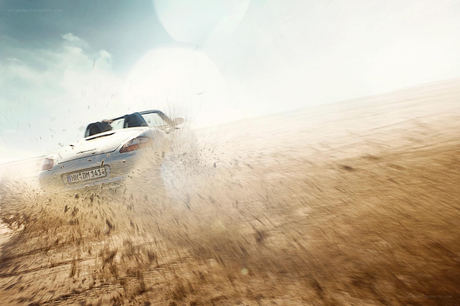 White car driving on dirt