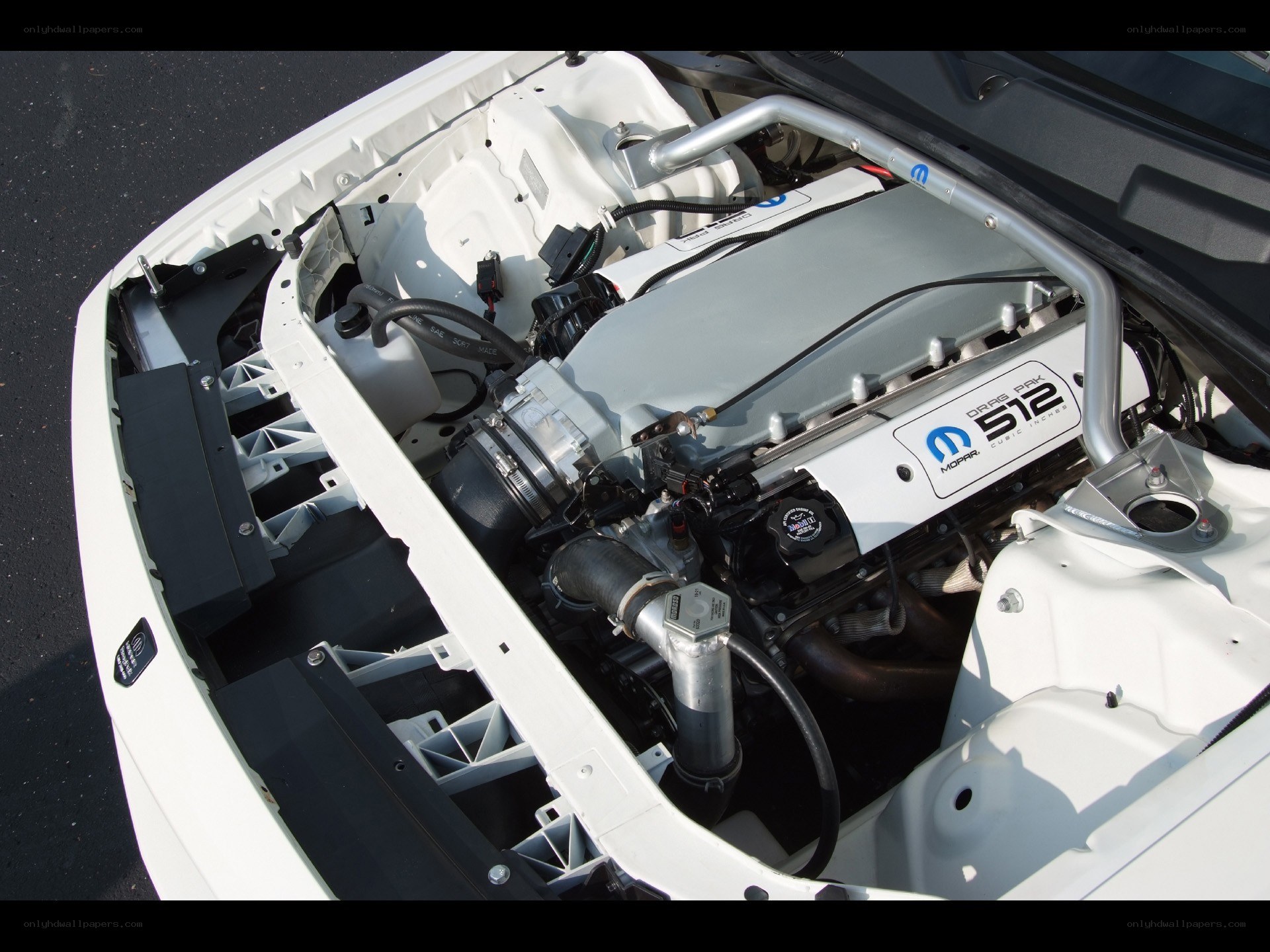 white car engine bay