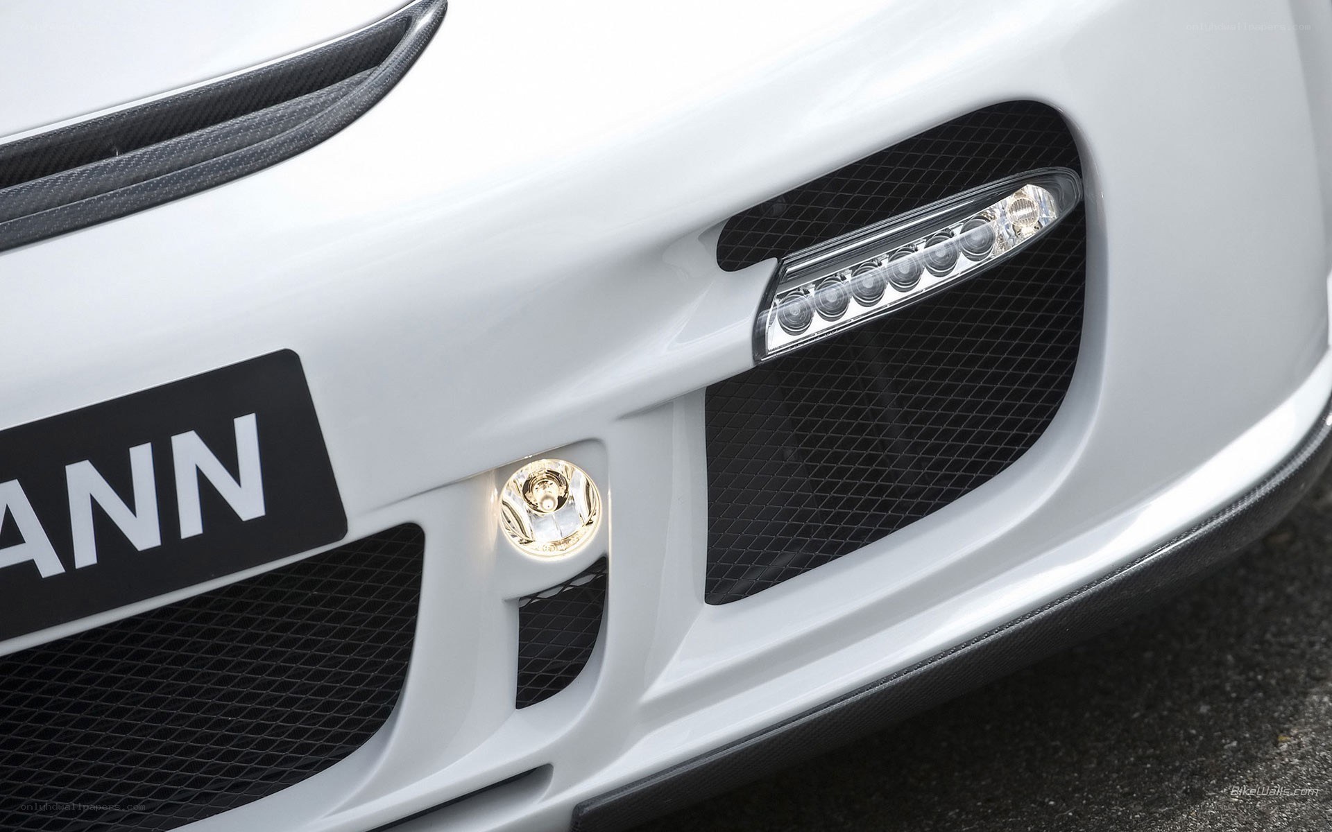 white car front bumper