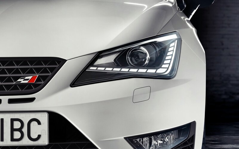 white car front headlight