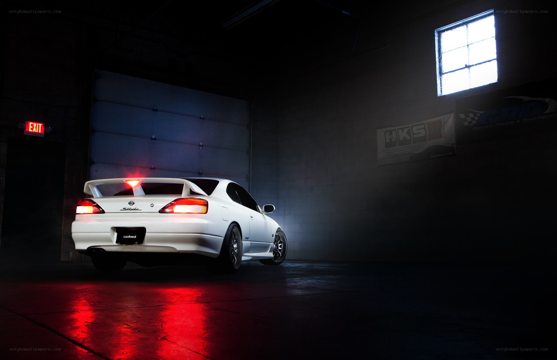 White car in a dark garage