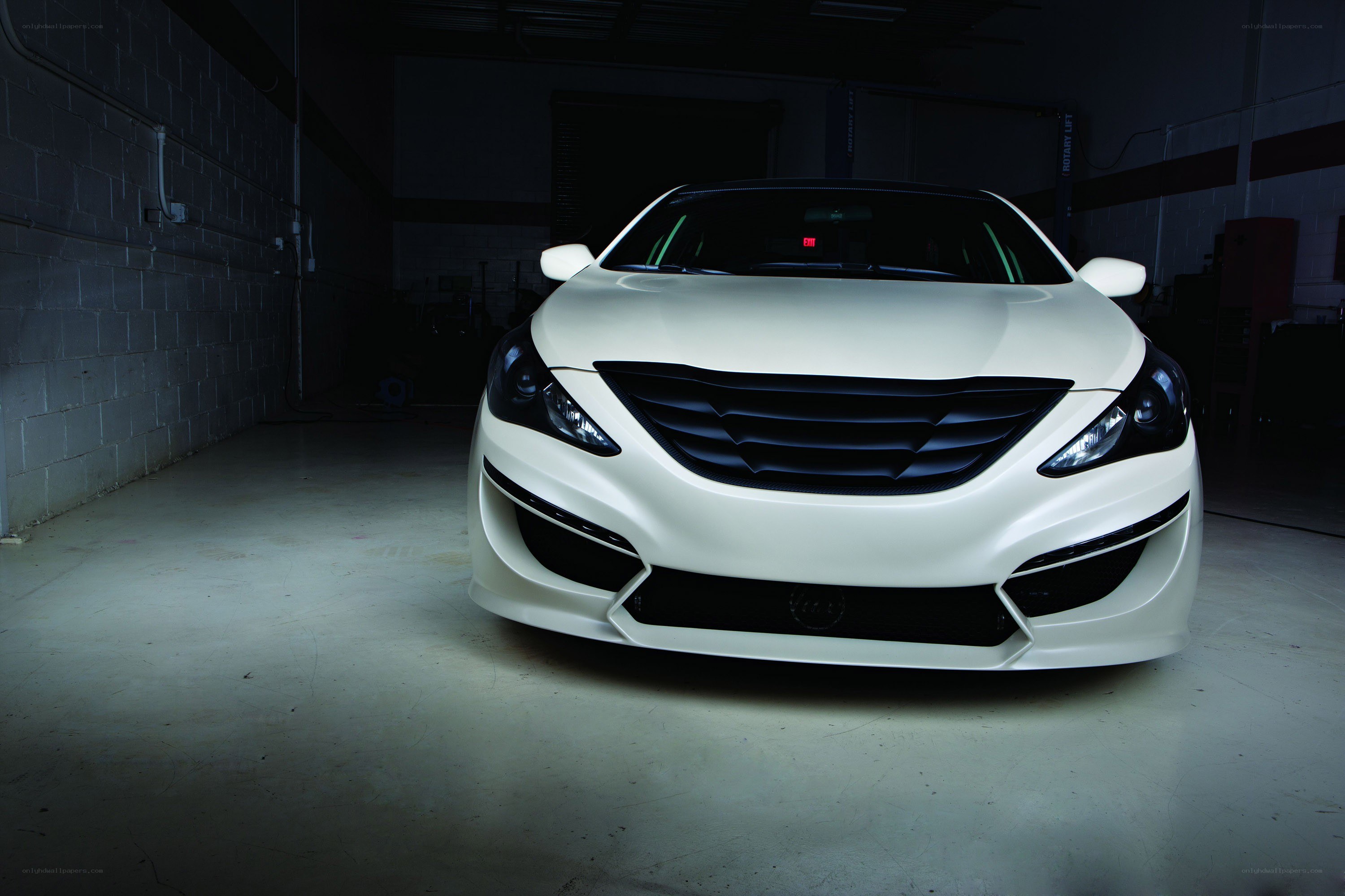 White car in a garage