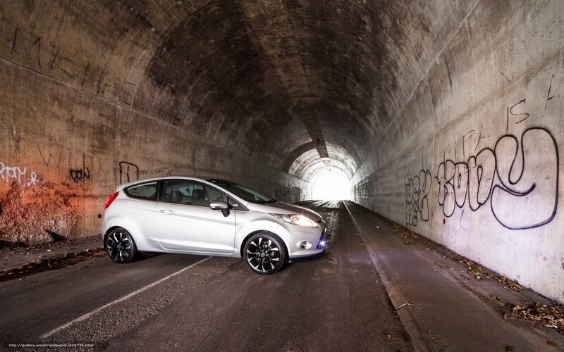 White car in a tunnel