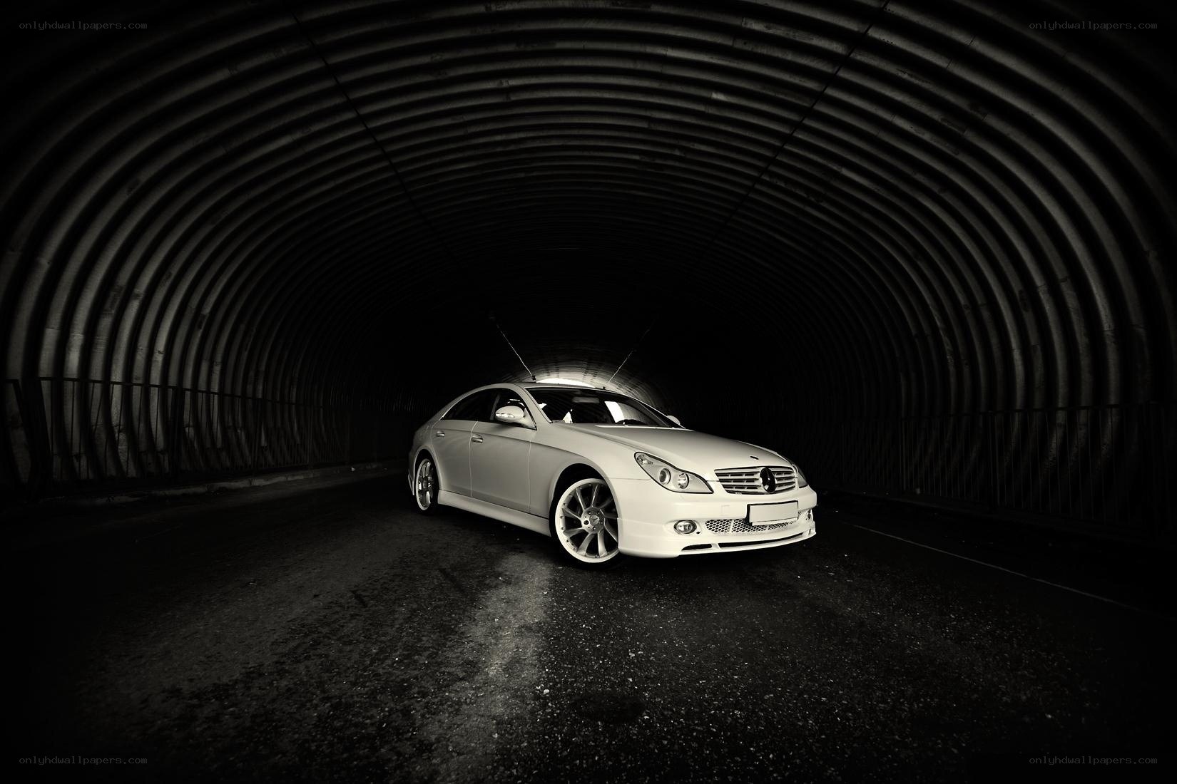 White car in a tunnel