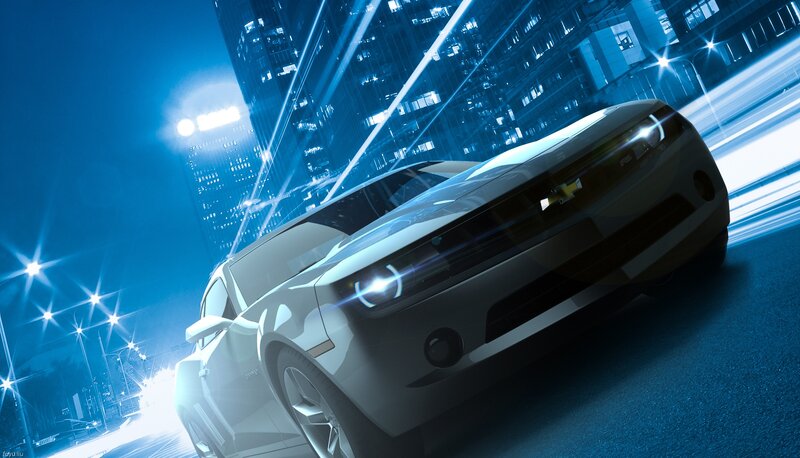 White car in city at night
