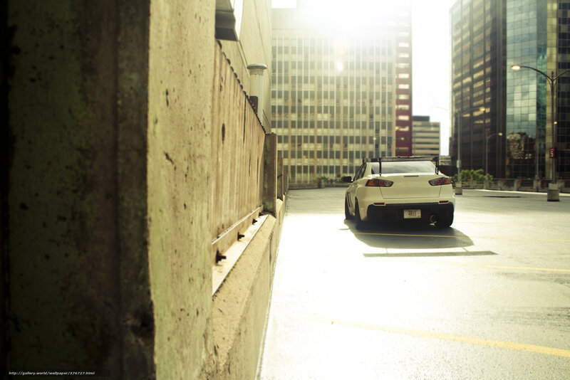 White car in city parking