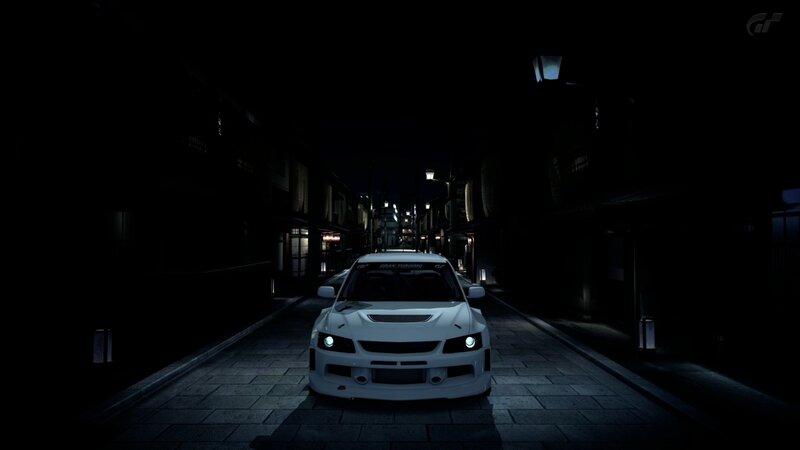 white car in dark alley