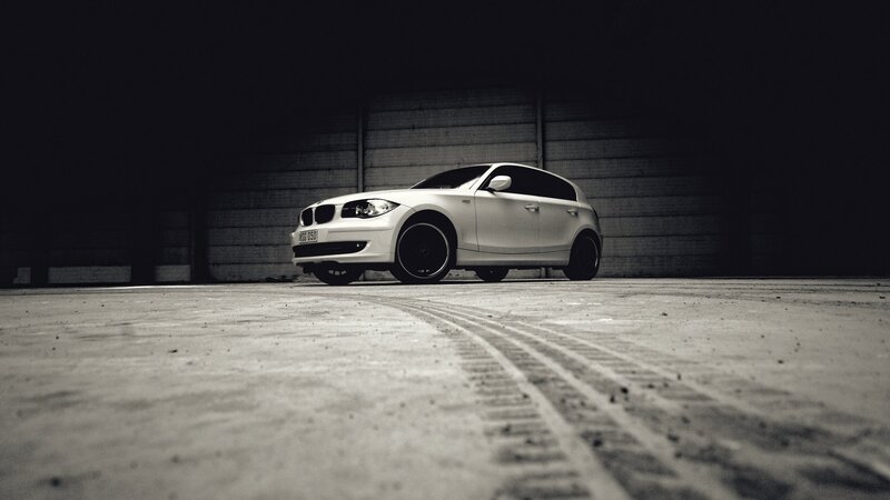 white car in dark garage