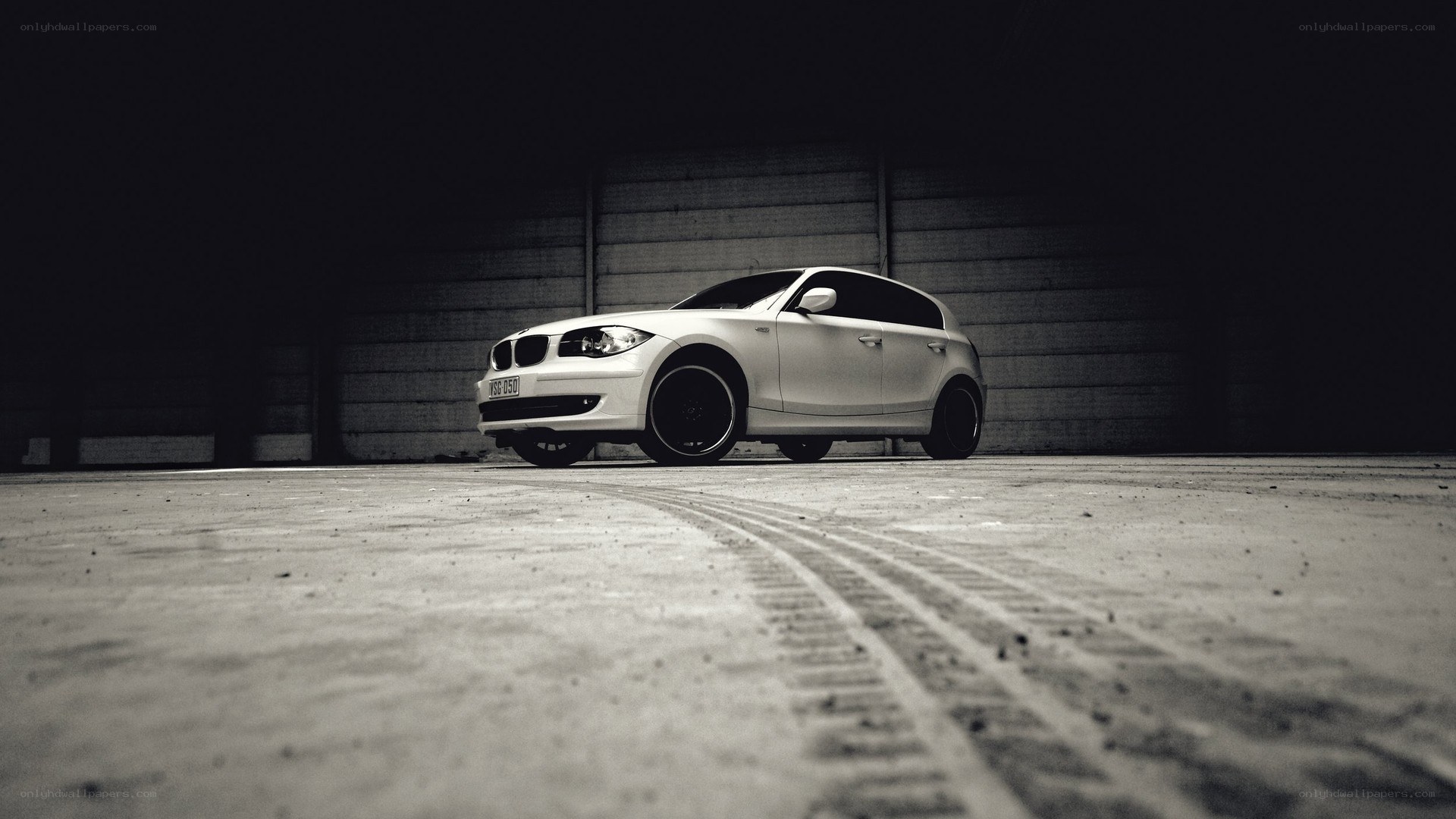 white car in dark garage