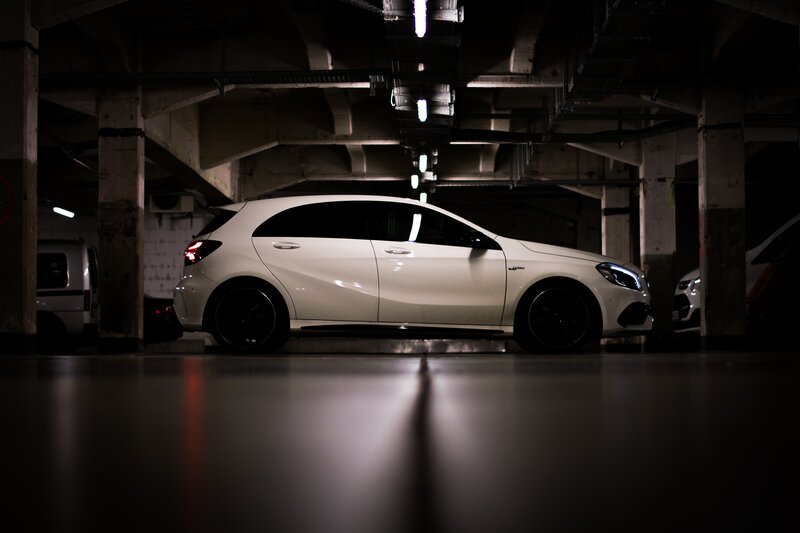 White Car in Garage — Dramatic, Night