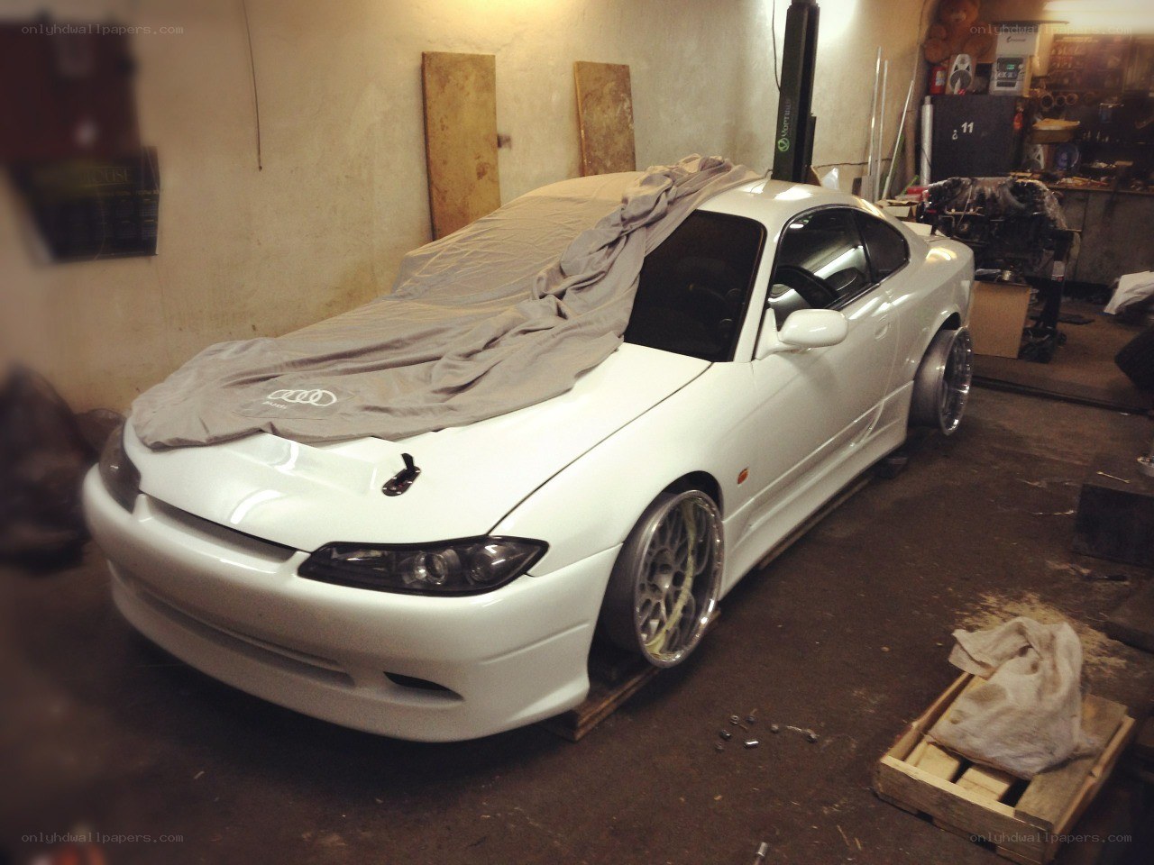 White car in garage workshop