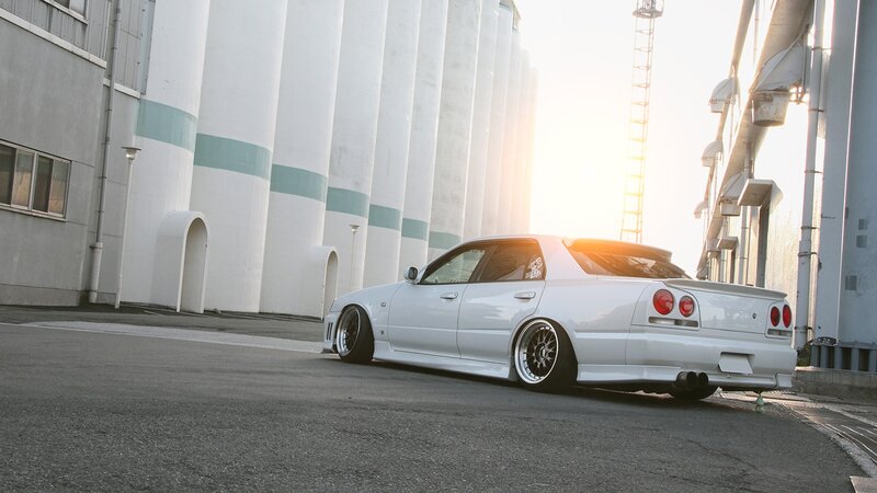 white car in industrial area